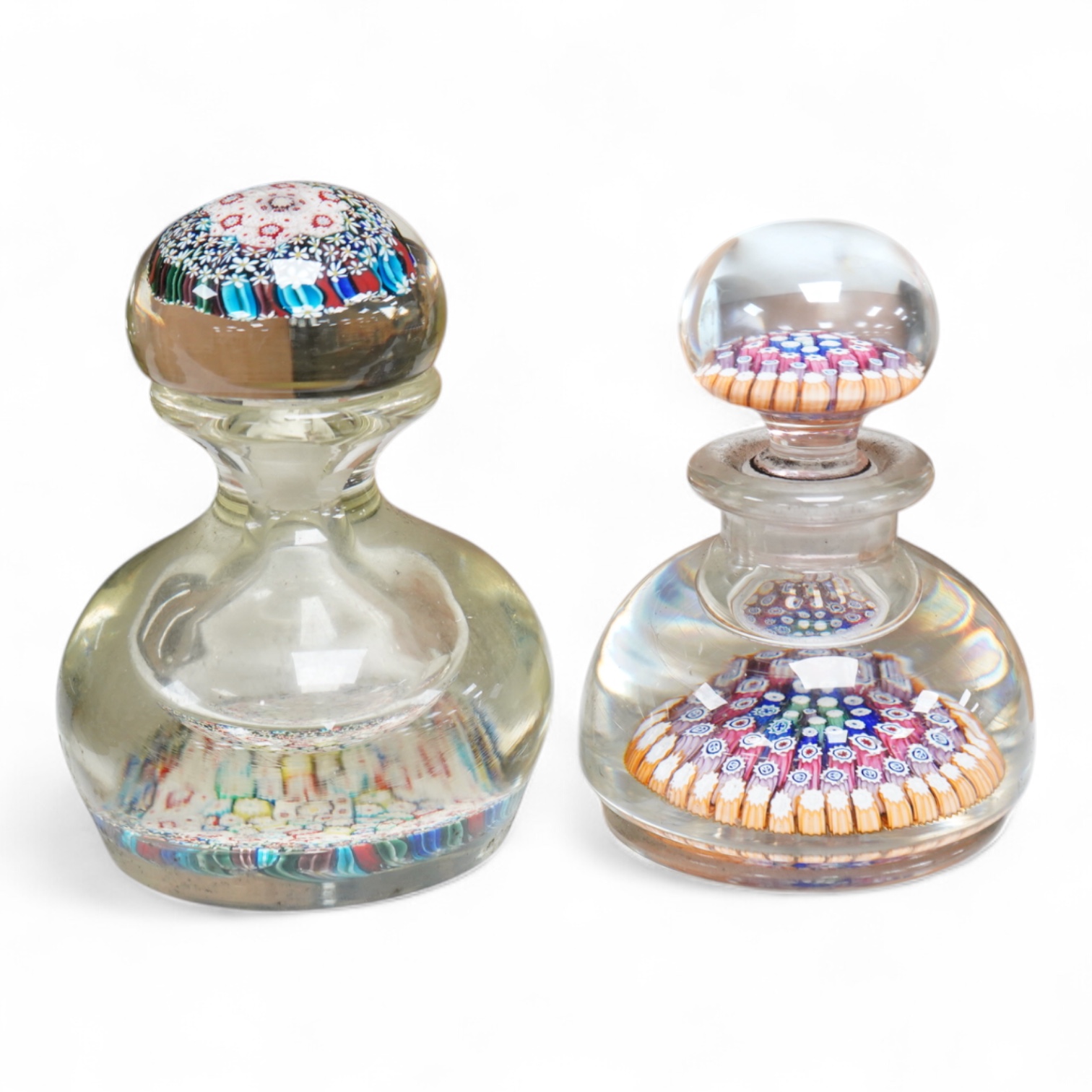 A 19th century millefiori glass inkwell and a similar 20th century inkwell. (2). Largest 16.5cm high